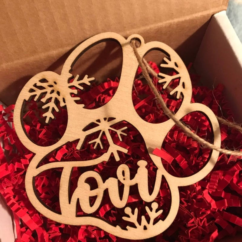 Personalised Wood Pet Paw Christmas Ornament With Name Engraved